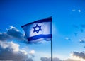 Israel flag waving cloudy sky background sunset