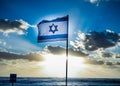 Israel flag waving cloudy sky background sunset