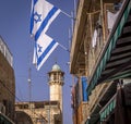 The Israel flags are on the streets of Jerusalem old city. Royalty Free Stock Photo