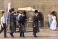 Israel, Jerusalem, lament-wall 15th September 2017 Three orthodox Jewish men walk among the tourists, on the grounds of the wailin