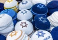 Israel, Jerusalem Mahane Yehuda Market with authentic Judaica kippah and Jewish food