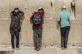 ISRAEL. JERUSALEM. 12.05.2018 - Three religious jews pray in The western wall , An Important Jewish religious site located in the