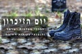 Israel Memorial day, Yom HaZikaron, Concept. Israeli army boots on the graveyard and monument to the fallen soldier