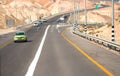 Road in the desert to Dead Sea resort Ein Bokek in Israel Royalty Free Stock Photo