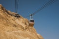 Israel - South - Masada - Aerial ropeway carriage goes from Masada visitor center up to the upper station