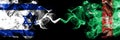Israel vs Turkmenistan, Turkmenistans smoky mystic flags placed side by side. Thick colored silky smokes flag of Israel and