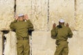 Israeli army IDF soldiers praying for peace at Western Wall in Jerusalem Old City during war with Hamas in Gaza that led Royalty Free Stock Photo