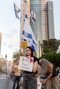 Israeli civillians gathered in solidarity for ceasefire between Israel and Gaza, holding banners for the missing and kidnapped