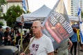 Israeli civillians gathered in solidarity for ceasefire between Israel and Gaza, holding banners for the missing and kidnapped