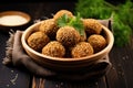 israeli falafel balls with sesame seeds in a basket