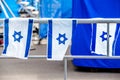 Israeli flags hang