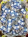 Israeli flags keychains or trinkets for sale at street market Royalty Free Stock Photo