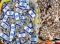 Israeli flags keychains or trinkets and souvenirs wooden small trees for sale at street market Royalty Free Stock Photo