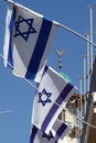 Israeli flags with the minaret of a mosque in the Old City of Jerusalem Royalty Free Stock Photo