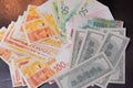 Israeli money notes and American dollars background