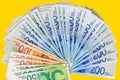 Israeli money notes isolated on yellow background Royalty Free Stock Photo