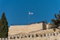 Israeli National flag waving on the view platform of Mount of Olive in Jerusalem, Israel