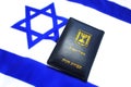 Israeli passport on the flag of Israel. Israeli citizenship, Israeli citizen, Repatriation, Emigration