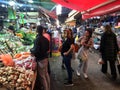 Israeli people buy fresh produce in Carmel Market in Tel Aviv Israel