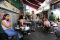 Israeli people dining in cafe restaurant in Kerem Ha Teimanim neighborhood Israel