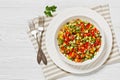 Israeli salad of finely diced veggies in bowl