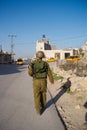 Israeli soldiers patrol in palestinian village