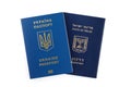 Israeli and Ukrainian foreign passports isolated on white background. Close-up Royalty Free Stock Photo