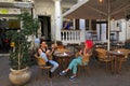 Israeli young women sitting in street outdoor cafe, Tel Aviv, Is