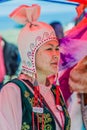 ISSYK KUL, KYRGYZSTAN - JULY 15, 2018: Local woman wearing traditional dress at the Ethnofestival Teskey Jeek at the