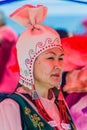 ISSYK KUL, KYRGYZSTAN - JULY 15, 2018: Local woman wearing traditional dress at the Ethnofestival Teskey Jeek at the