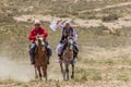 ISSYK KUL, KYRGYZSTAN - JULY 15, 2018: Performance of kyz kuuma girl chasing , equestrian traditional sport at the