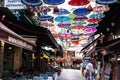 ISTAMBUL, TURKEY - 15 DE MAYO DE 2019: Colorful umbrellas in the sky in a street in Istanbul. Royalty Free Stock Photo