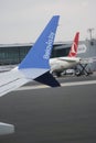 Istanbul Ataturk Airport. Airplanes near the airport building. Close-up