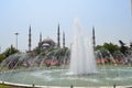 Istanbul Blue Mosque (Sultan Ahmed Mosque) and fountain view from the Sultanahmet Park in Turkey Royalty Free Stock Photo