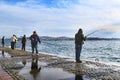 Istanbul bosphorus, fishing rod with the fish hunting Royalty Free Stock Photo