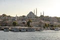 Istanbul in the evening. View from Galata bridge to Eminonu and Suleymaniye Mosque Ottoman imperial mosque. Turkey. Royalty Free Stock Photo