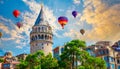 Istanbul Galata Tower and hundreds of colorful hot air balloons in the sky