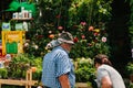 Istanbul, June 15, 2017: Authentic scene. A local flower seller offers the buyer to buy beautiful fresh flowers. A small