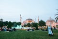 Istanbul, June 16, 2017: Many people of the Islamic religion take food on the Sultanahmet square next to the blue mosque