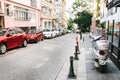 Istanbul, June 14, 2017: Pespective view down the road on passage street with parked vehicles in Kadikoy district.