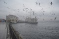 Istanbul, Kadikoy. Foggy morning, waiting to ferry passengers an Royalty Free Stock Photo