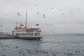 Istanbul, Kadikoy. Foggy morning, waiting to ferry passengers an Royalty Free Stock Photo