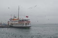 Istanbul, Kadikoy. Foggy morning, waiting to ferry passengers an Royalty Free Stock Photo