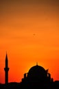 Istanbul mosques silhouettes in sunset orange sunlight.