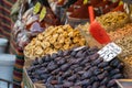 Close up storefront with dry nuts, dates and figs. National Turkish street market