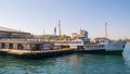 Ferry boat at Kadikoy Ferry Terminal getting ready for sailing after passengers loading at midday, Istanbul, Turkey