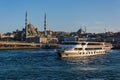 ISTANBUL, TURKEY - APRIL 11, 2014: Galata Bridge over Golden Horn. Fish restaurants and shops on the first floor