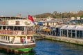 Passengers Loading into local ferry in Eminonu ferry terminal before sunset, Istanbul, Turkey