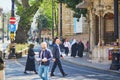 ISTANBUL, TURKEY - APRIL 24, 2023: People walking by a street in Sultanahmet district in Istanbul, Turkey