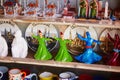 ISTANBUL, TURKEY - APRIL 25, 2023: Various figurines of dervishes for sale on a street market in Istnabul, Turkey Royalty Free Stock Photo